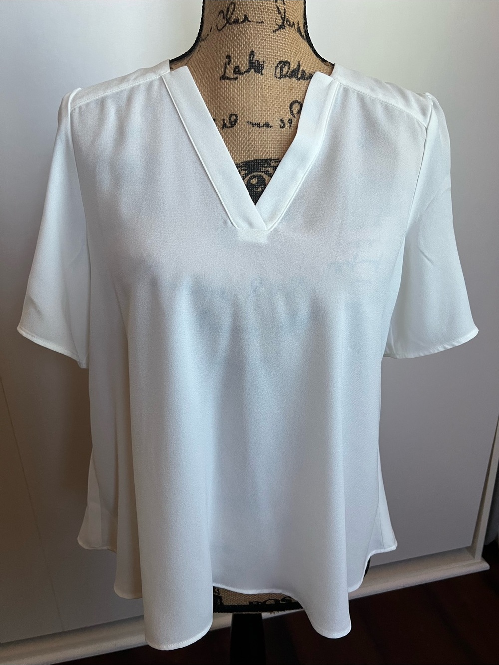 CAbi Essential White V-Neck Short Sleeve Blouse Style # 6086